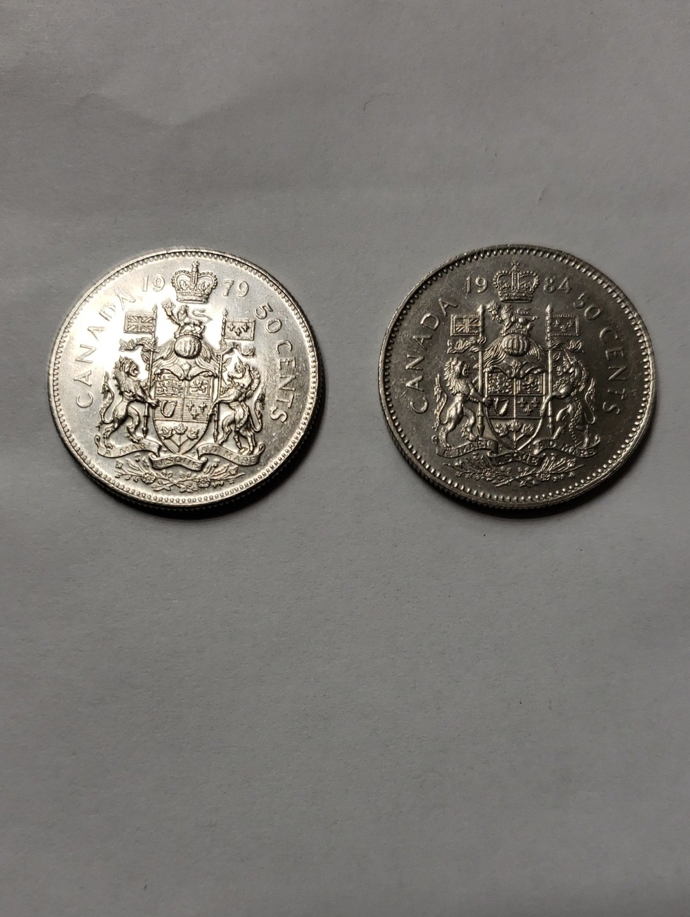 Pair of Canadian 50 Cent Coins - Silver Tone